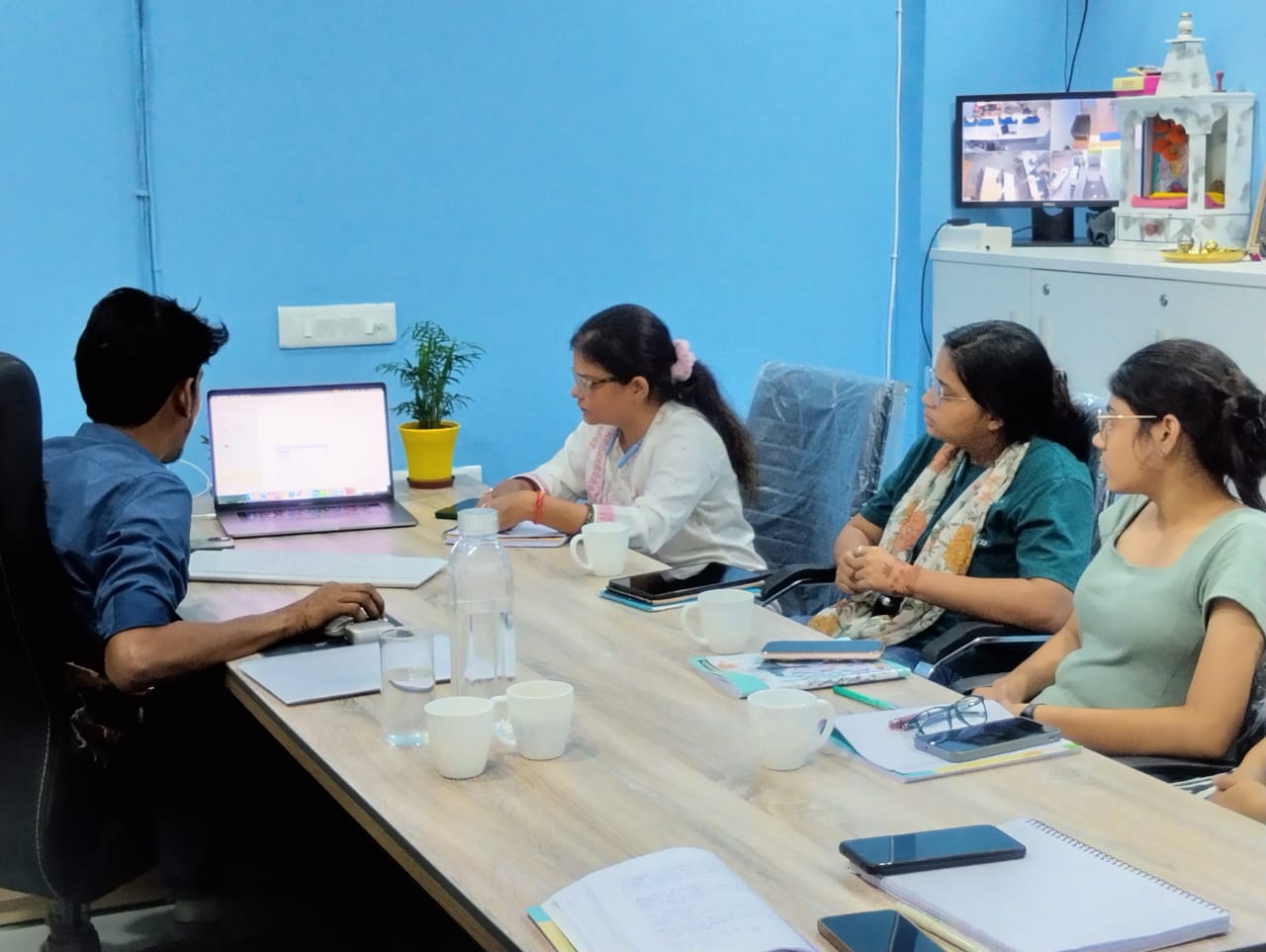 Team members of Ethersoftex IT Solutions in a client meeting and discussion session at the Lucknow office.